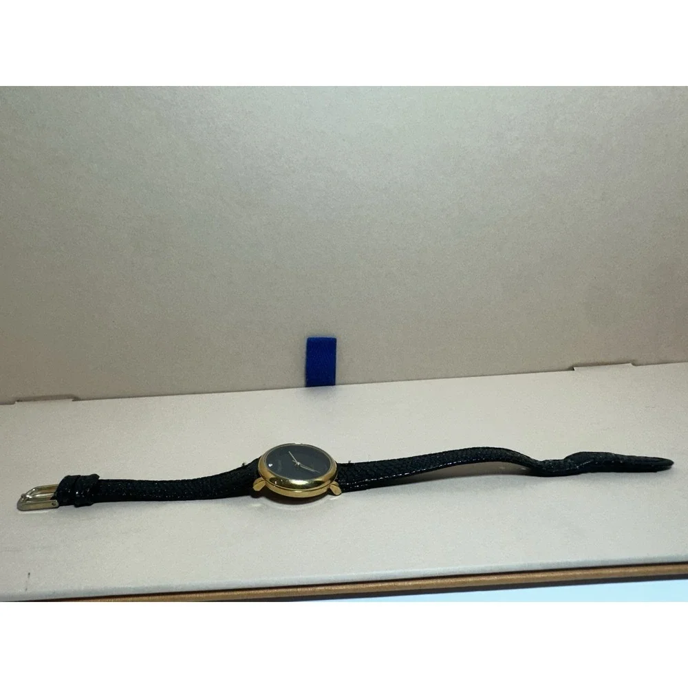 Oleg Cassini Women's Quartz Watch 25.4mm Gold Tone Leather Band‎